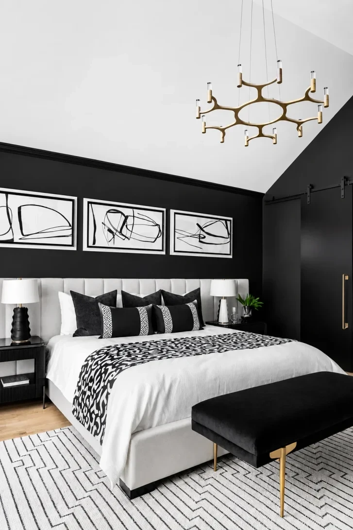 Brass Chandelier Steals the Show Against Black Walls