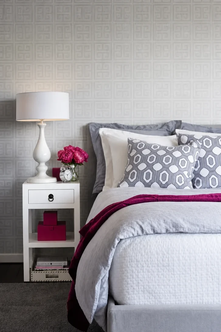 Magenta Accents Ignite an All-Grey Bedroom