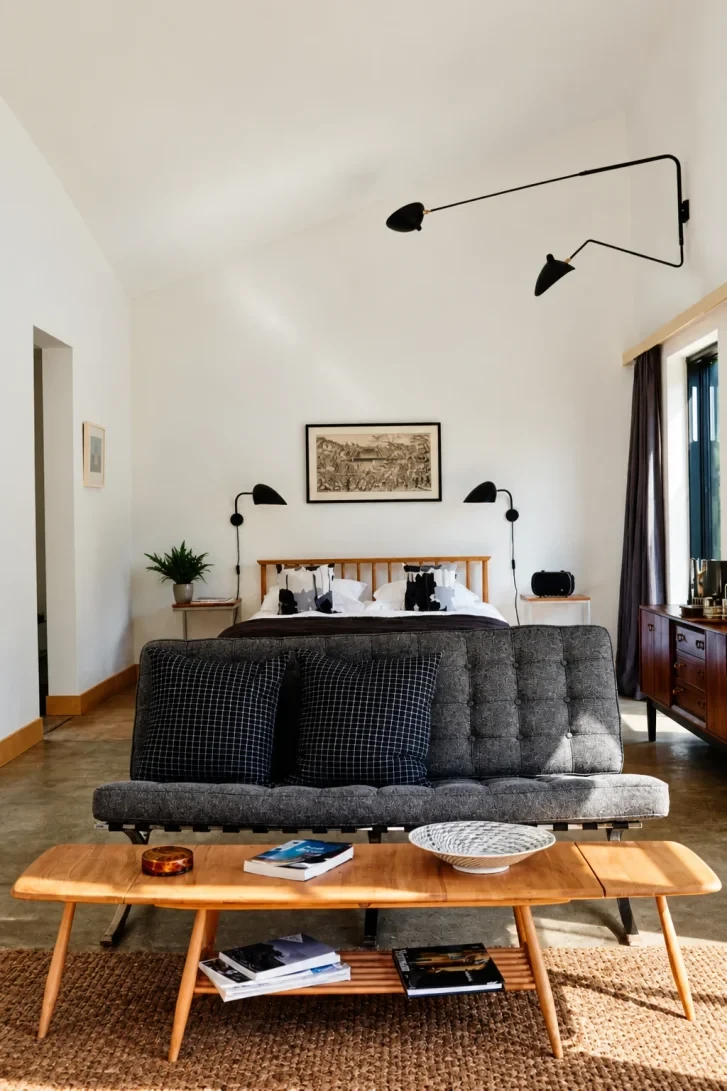 One Giant Swing-Arm Sconce Dominates Everything